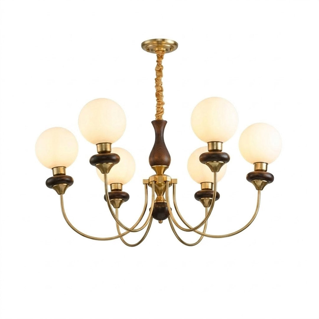 Estelle wood glass chandelier above dining table warm Edison filament glow French farmhouse interior
