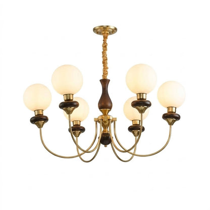 Estelle wood glass chandelier above dining table warm Edison filament glow French farmhouse interior