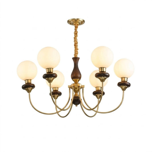 Estelle wood glass chandelier above dining table warm Edison filament glow French farmhouse interior