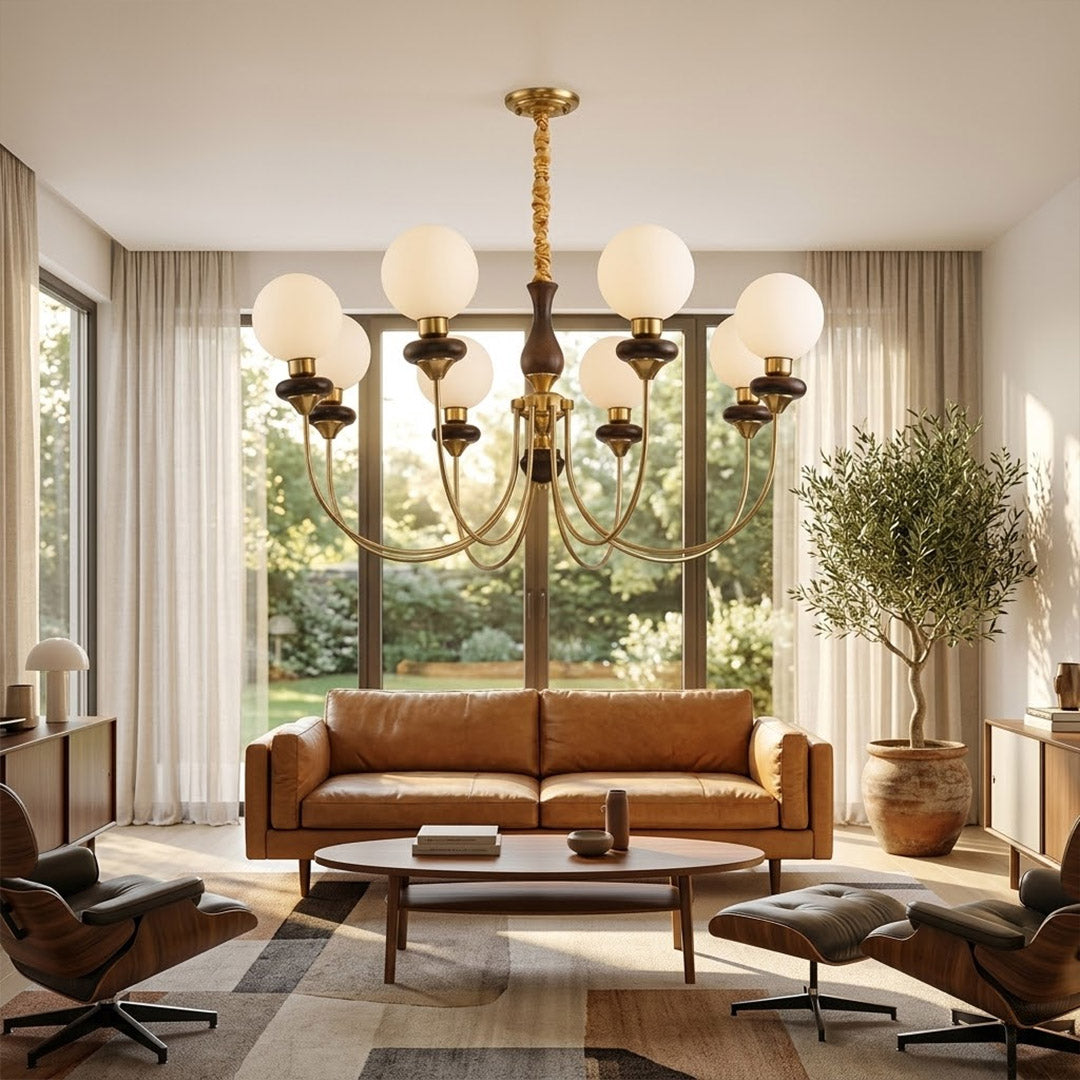 Estelle wood glass chandelier above dining table warm Edison filament glow French farmhouse interior