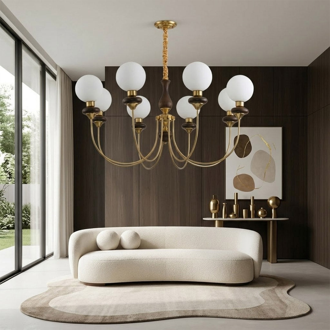 Estelle wood glass chandelier above dining table warm Edison filament glow French farmhouse interior
