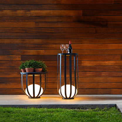 Faceta outdoor garden lights illuminating a villa courtyard with a warm modern glow