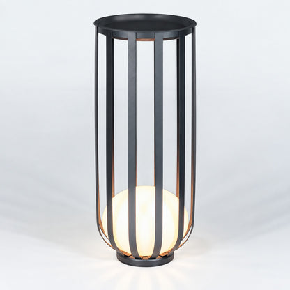Tall 37.4-inch hardwired Faceta outdoor garden light as a floor lantern beside a patio seat