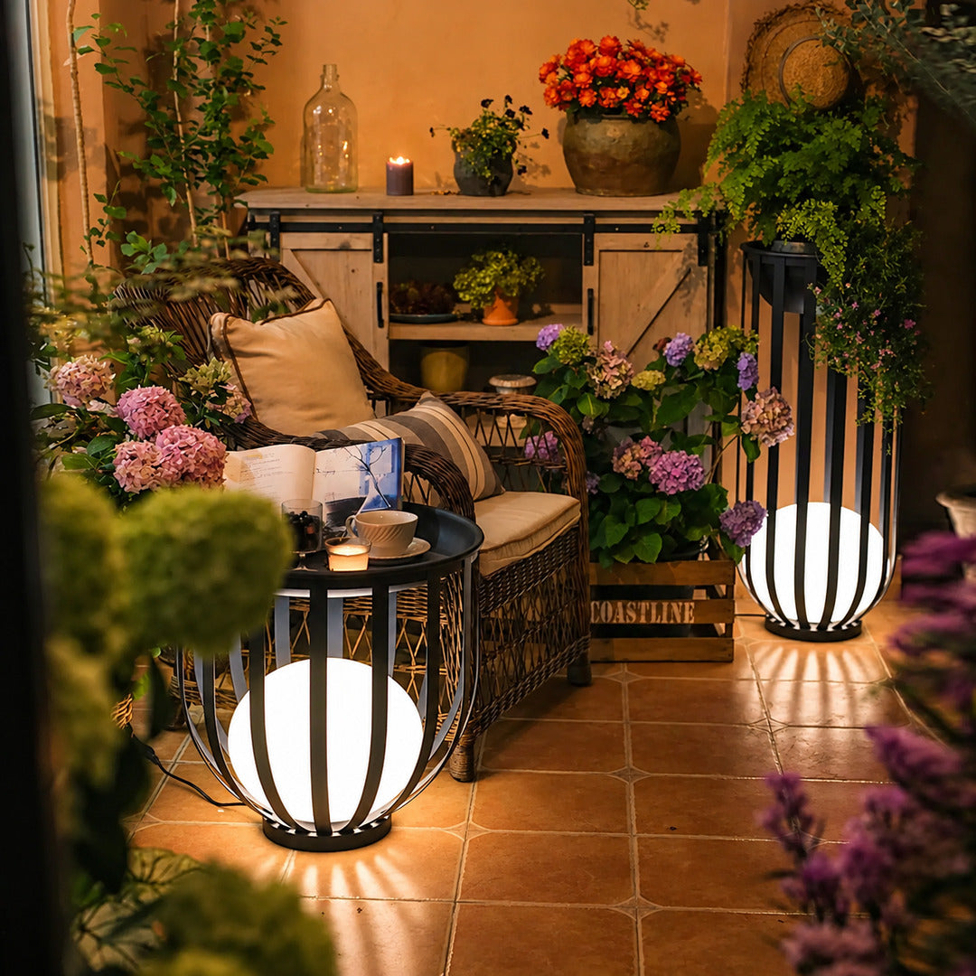 Faceta outdoor garden light adding a warm geometric glow to a backyard patio at night