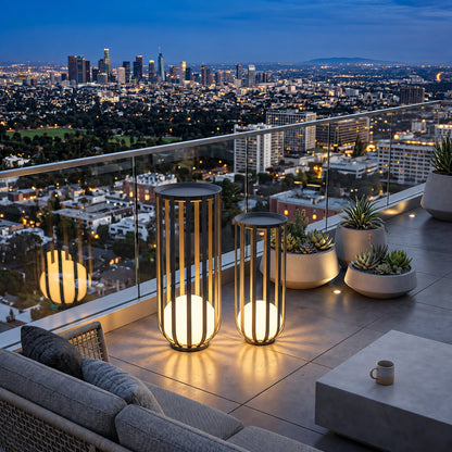 Row of Faceta outdoor garden lights lighting a restaurant garden terrace at night