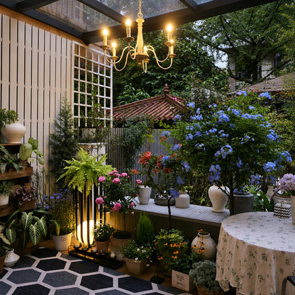 Faceta outdoor garden light adding a warm geometric glow to a backyard patio at night