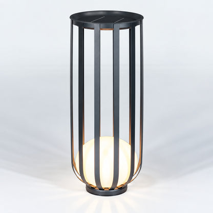 Tall 37.4-inch solar Faceta outdoor garden light standing beside a garden path