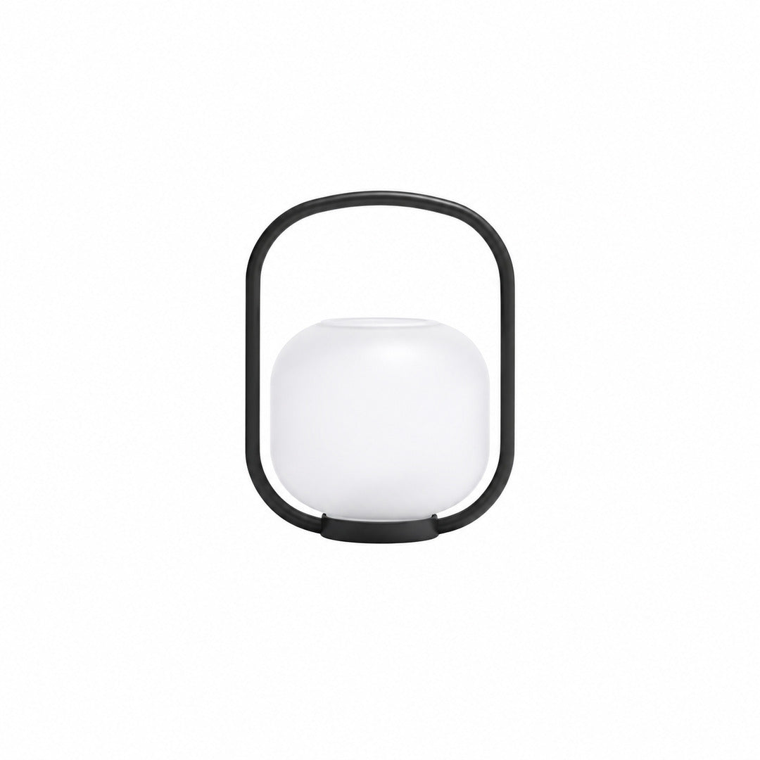 Small 15.4-inch USB-rechargeable Falo portable lantern on a bistro patio table