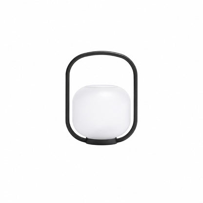 Small 15.4-inch USB-rechargeable Falo portable lantern on a bistro patio table