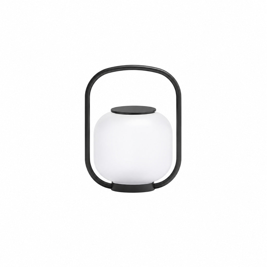 Small 15.4-inch solar Falo portable lantern charging on a sunny garden table