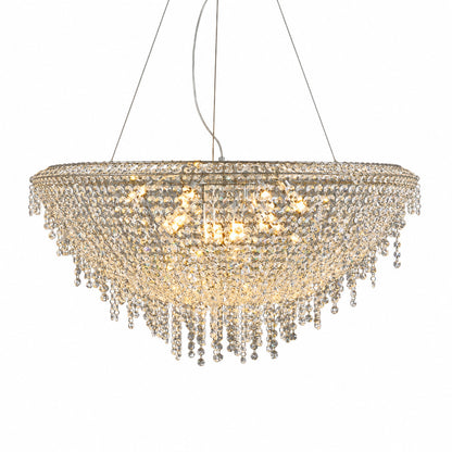 Fiocco modern crystal chandelier with a dome silhouette and cascading crystal tassels in a living room