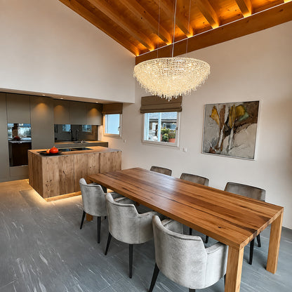 Fiocco crystal chandelier sparkling above a dining room table