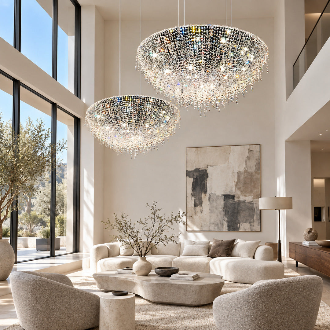 Large Fiocco crystal chandelier welcoming guests in a double-height entryway