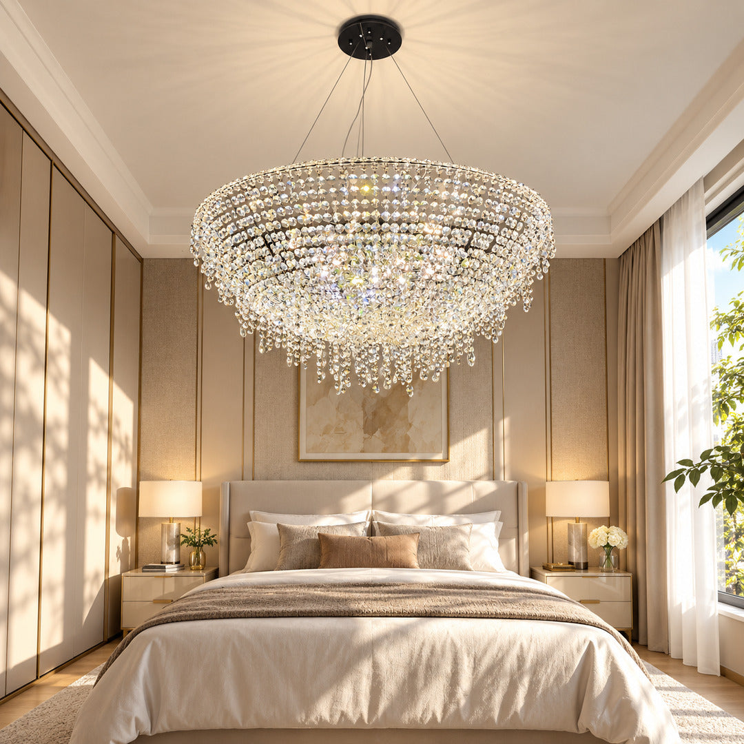 Fiocco crystal chandelier creating a glamorous glow in a primary bedroom