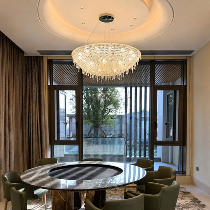Fiocco crystal chandelier sparkling above a dining room table