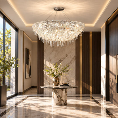 Large Fiocco crystal chandelier welcoming guests in a double-height entryway