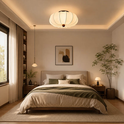 Fiora silk pleated cloud ceiling lamp Japandi primary bedroom linen oak wood warm walnut center serene minimalist warm diffused glow lifestyle interior modern