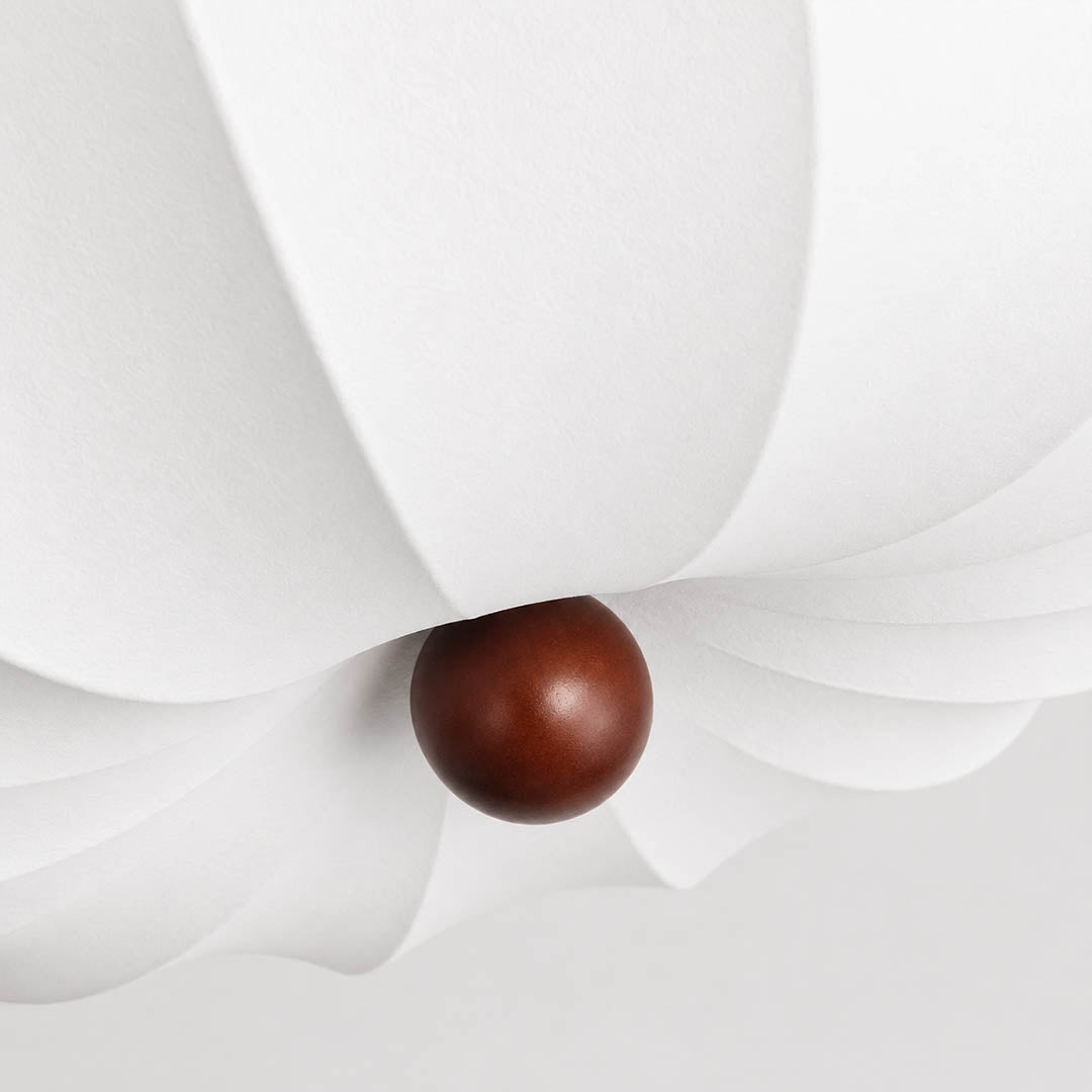 Fiora pinstripe pleated silk shade texture radial vertical pleats handcrafted delicate detail close up craftsmanship blooming flower petal soft folds