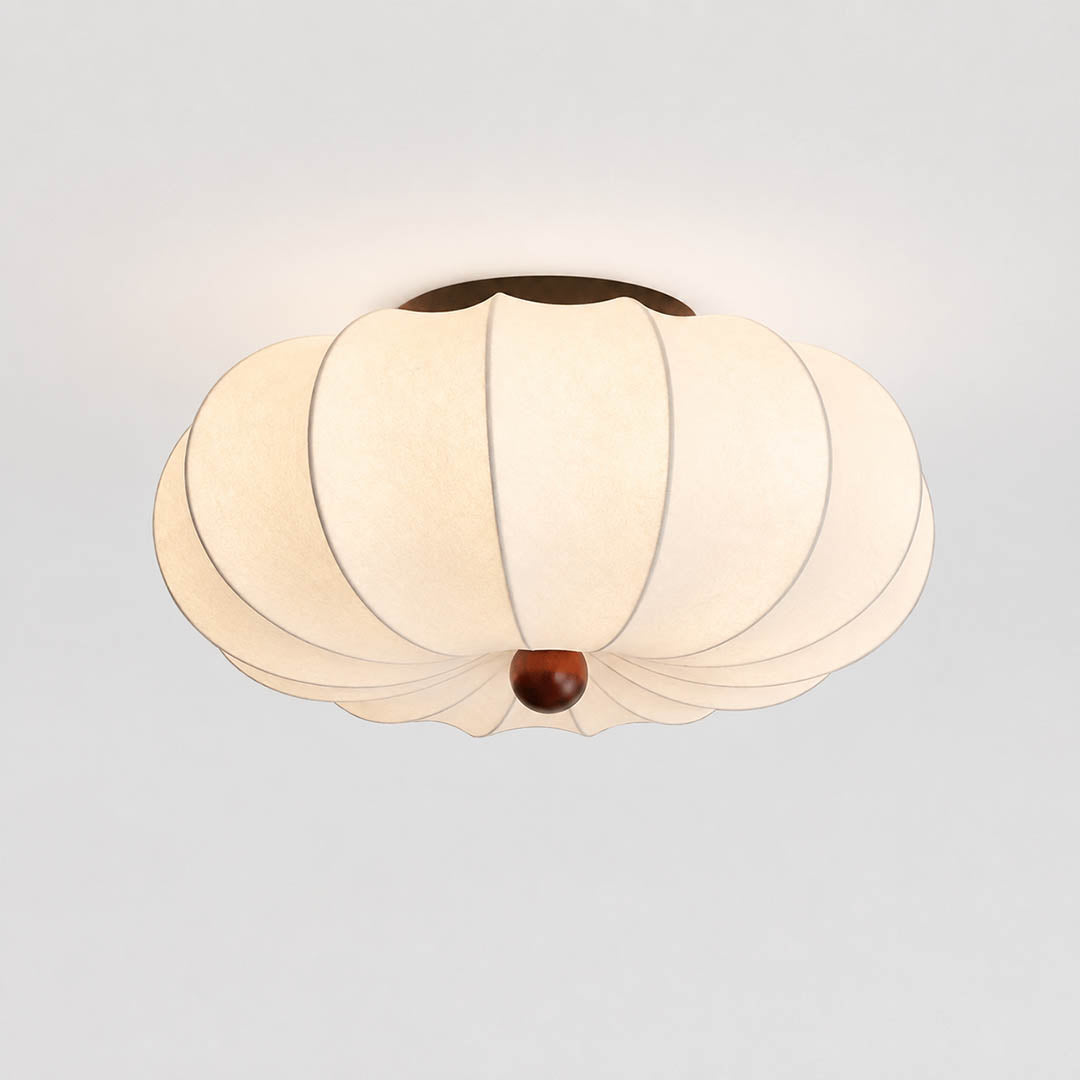 Fiora silk pleated cloud ceiling lamp illuminated warm 3000K glow evening serene diffused halo pinstripe pleats subtle luminous ambient detail close up meditation