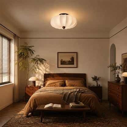 Fiora silk pleated cloud ceiling lamp Japandi primary bedroom linen oak wood warm walnut center serene minimalist warm diffused glow lifestyle interior modern
