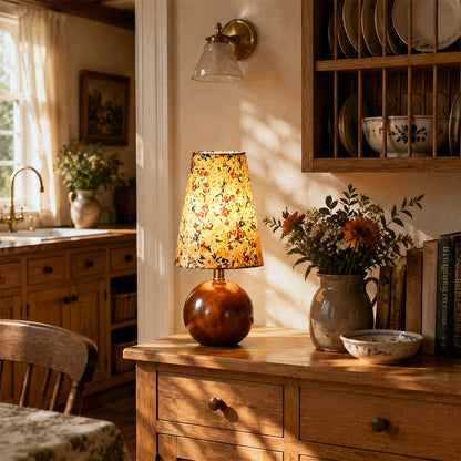 Fleur floral table lamp entryway console illuminated warm glow floral fabric wood American home lifestyle interior styled