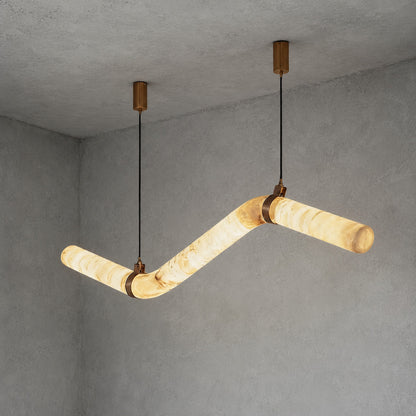 Model A Flutto alabaster chandelier at 59 inches as a grand statement over an open-plan island