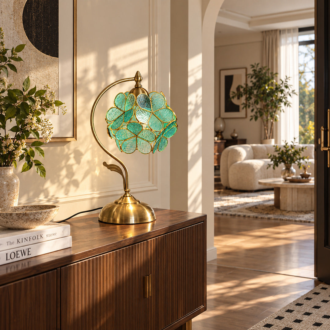 Foglia glass leaf table lamp adding a warm decorative accent to an entryway console