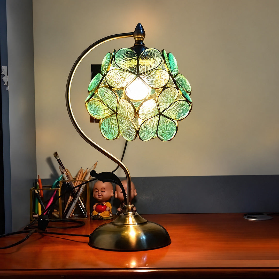 Foglia glass table lamp adding a nature-inspired accent to a home office desk