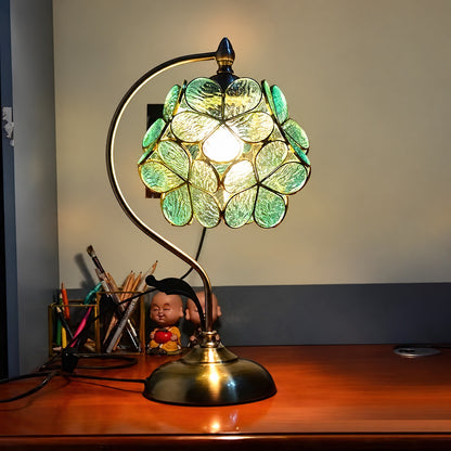 Foglia glass table lamp adding a nature-inspired accent to a home office desk