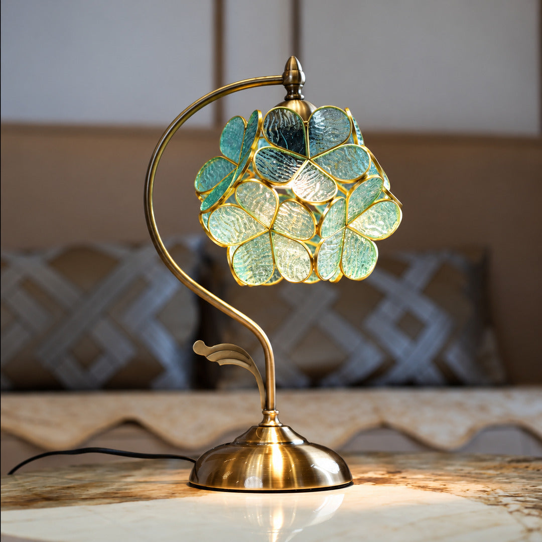 Foglia glass table lamp adding a nature-inspired accent to a home office desk