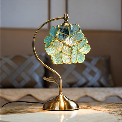 Foglia glass table lamp adding a nature-inspired accent to a home office desk