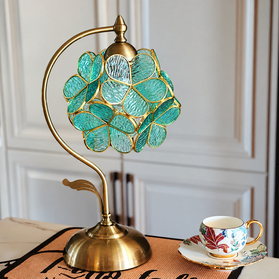 Foglia glass leaf table lamp on a boutique hotel room nightstand as a designer accent