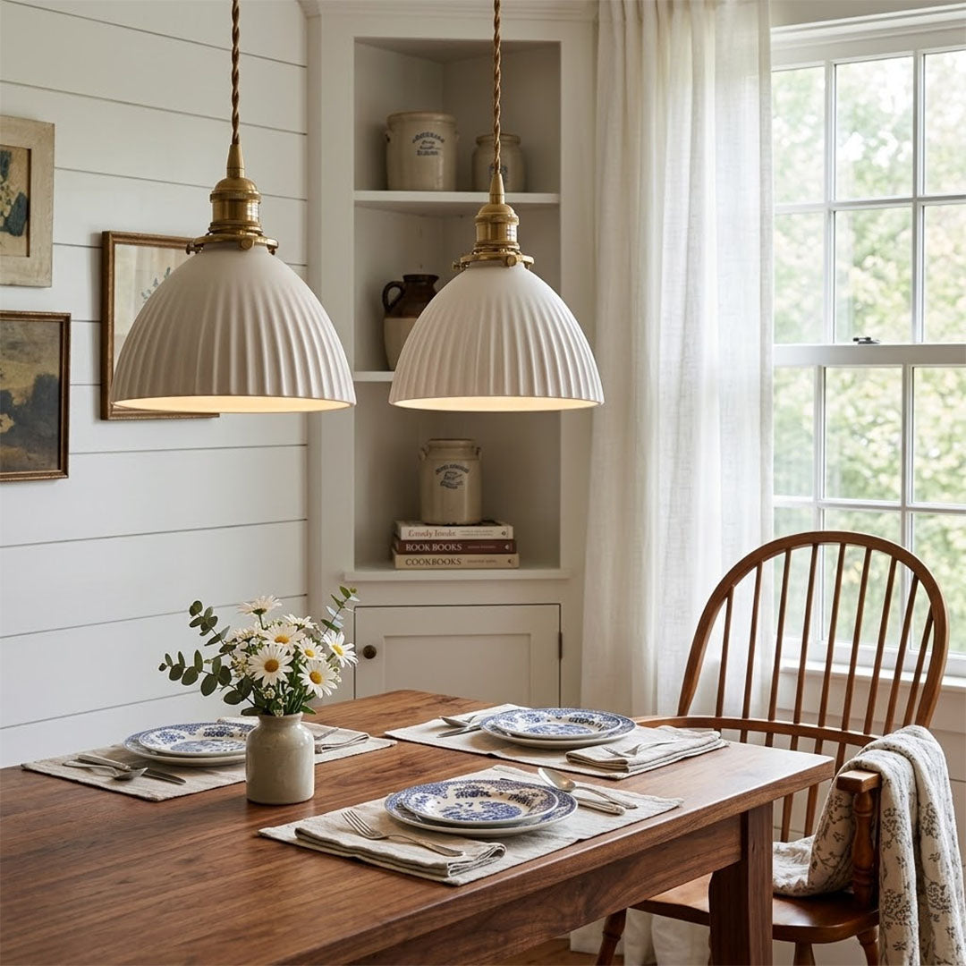 Freya Set of 2 pleated ceramic pendants pair above kitchen island Nordic Scandinavian minimalist white interior warm glow
