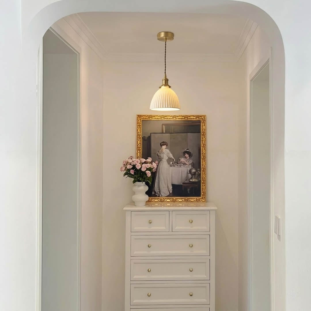 Freya single pleated ceramic pendant over kitchen sink modern Nordic Scandinavian white countertop warm glow interior