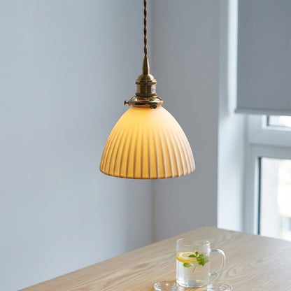 Freya single pleated ceramic pendant over kitchen sink modern Nordic Scandinavian white countertop warm glow interior