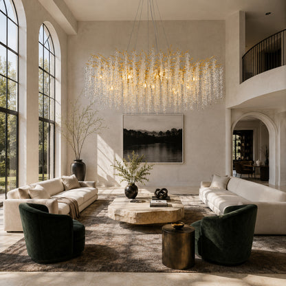 Fronda gold crystal chandelier adding glamour to a living room