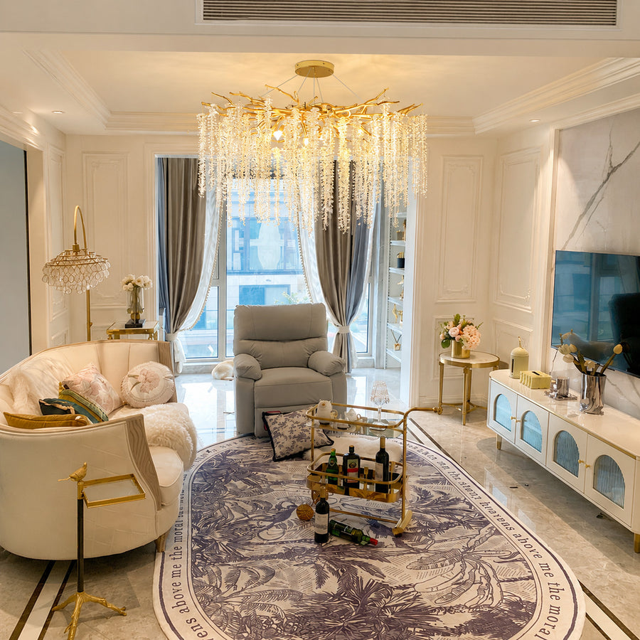 Fronda gold crystal chandelier adding glamour to a living room