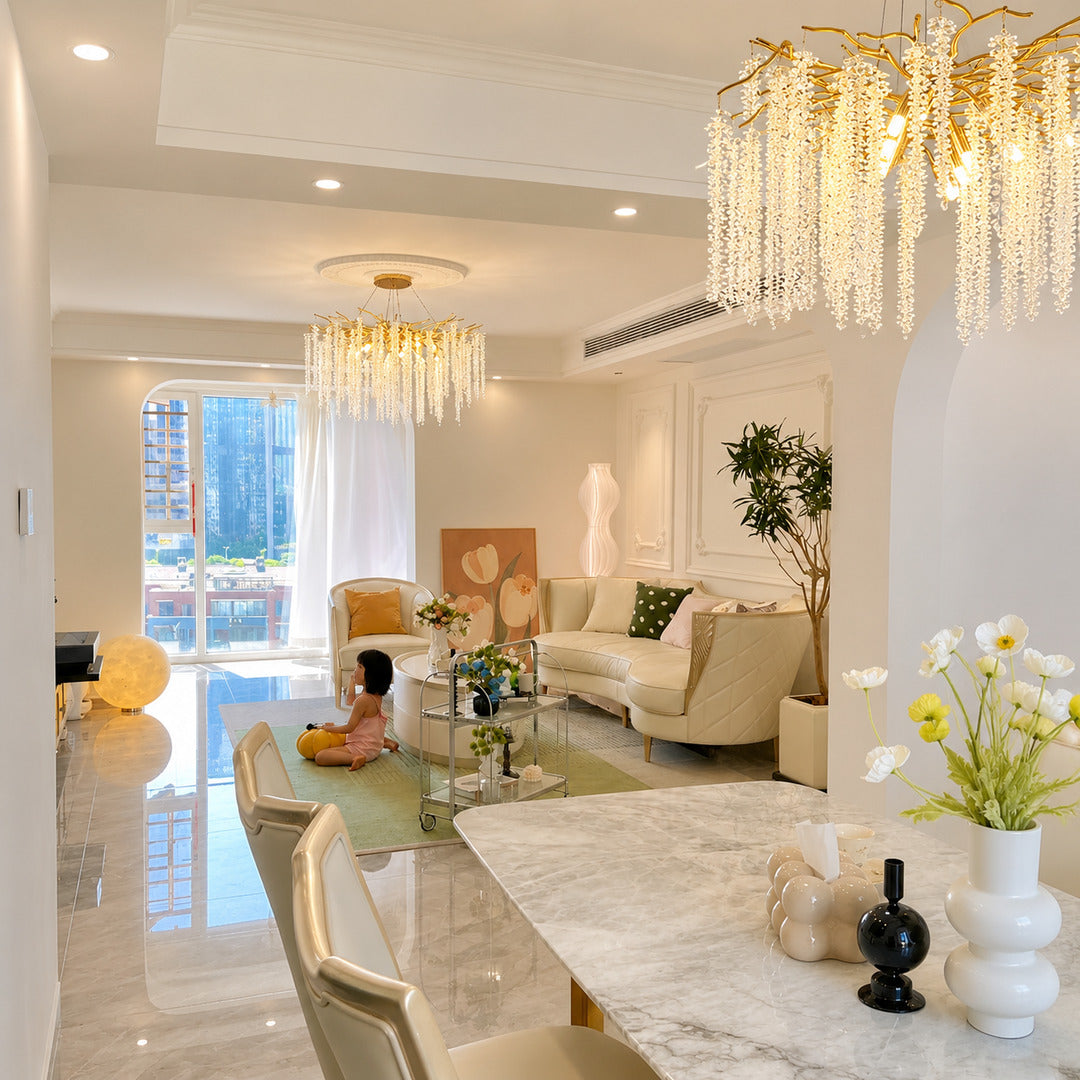 Fronda gold crystal chandelier adding glamour to a living room