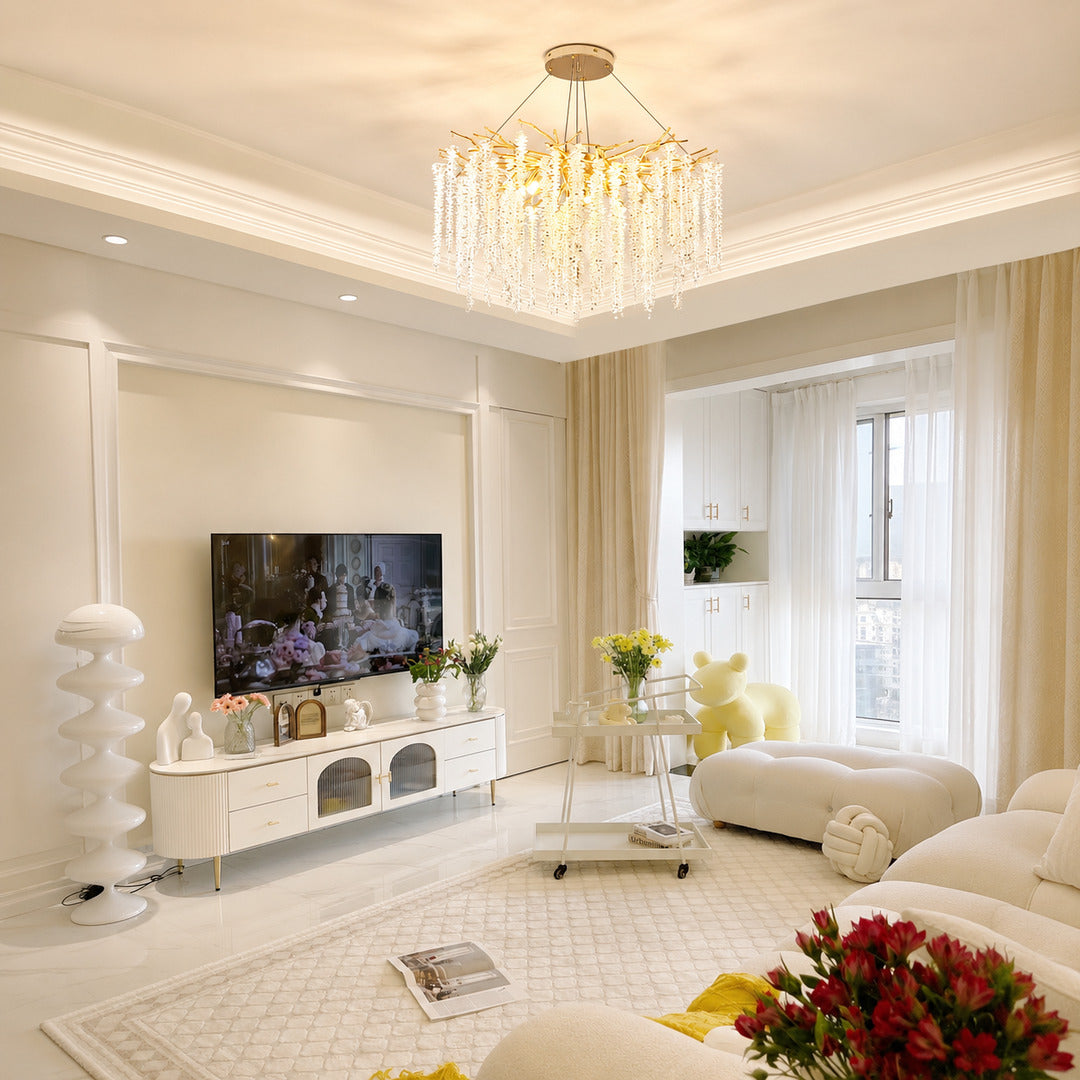 Fronda gold crystal chandelier adding glamour to a living room