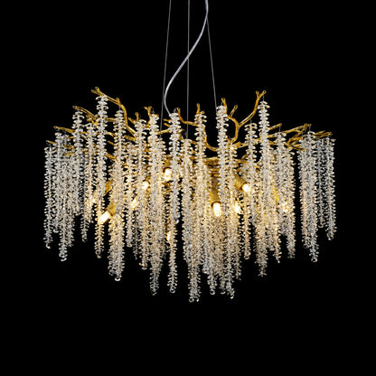 10-light 31.5-inch Fronda gold crystal chandelier in a living room