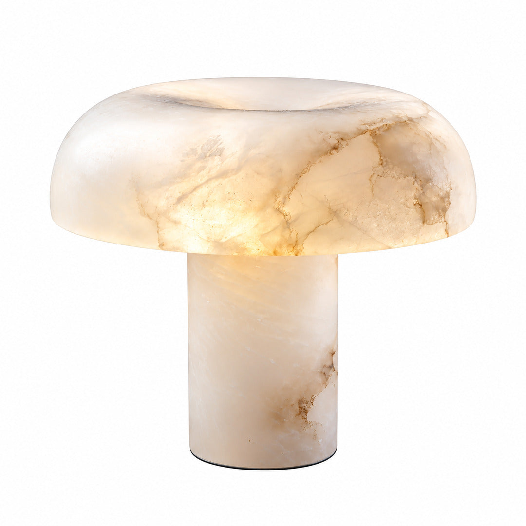 Fungo mushroom table lamp with natural alabaster dome and brass accents on a white background
