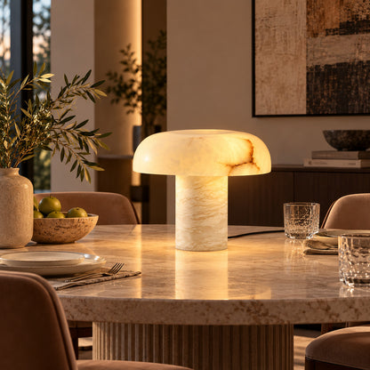 Fungo alabaster mushroom lamp in a wabi-sabi bedroom with linen bedding