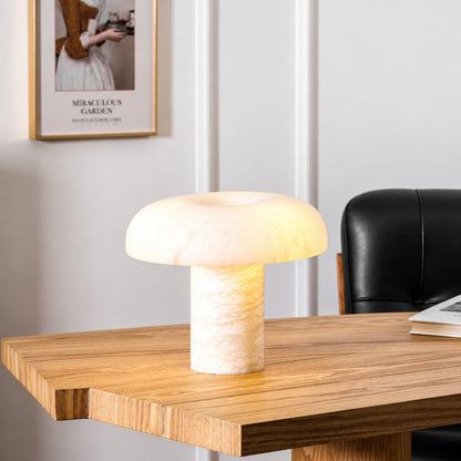 Fungo alabaster mushroom lamp lighting a home office desk