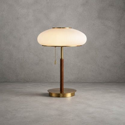 Fungo glass table lamp illuminated glass shade warm diffused glow soft light detail close up cozy