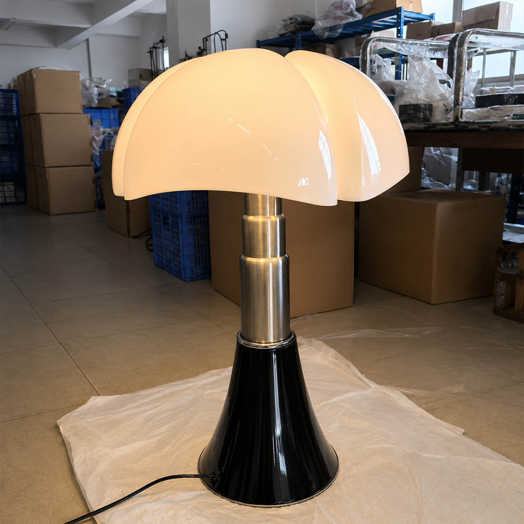Fungo table lamp signature black metal base column slender minimalist mid century modern powder coated detail close up craftsmanship