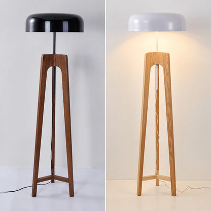 Walnut-and-black and natural-wood-and-white options of the Fungo wood floor lamp shown side by side