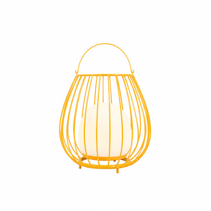 Yellow Gabbia rechargeable lantern bringing a cheerful summer glow to a porch