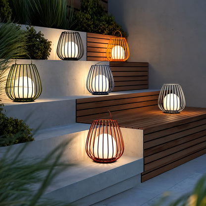 Gabbia rechargeable lanterns placed on outdoor patio steps for safe warm lighting at night