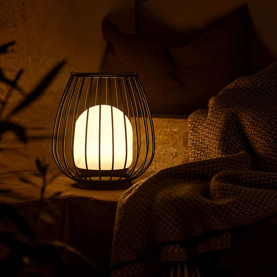 Gabbia rechargeable lanterns placed on outdoor patio steps for safe warm lighting at night