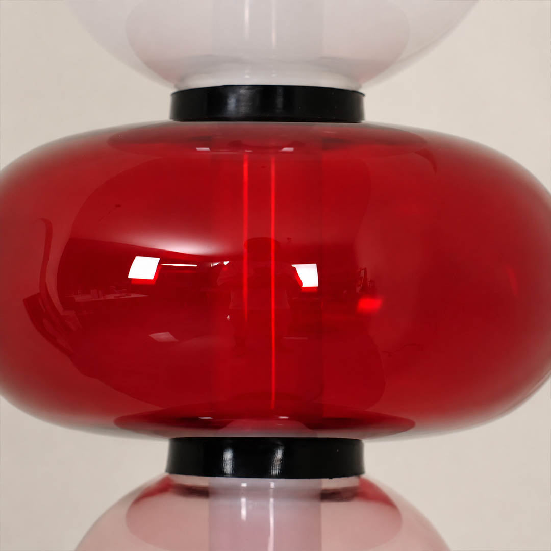 Gemma stacked glass floor lamp stacked glass orbs sculptural silhouette metal frame detail close up structure